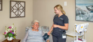 Healthcare worker with resident